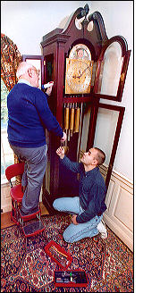 Pat and Chris working on grandfather clock